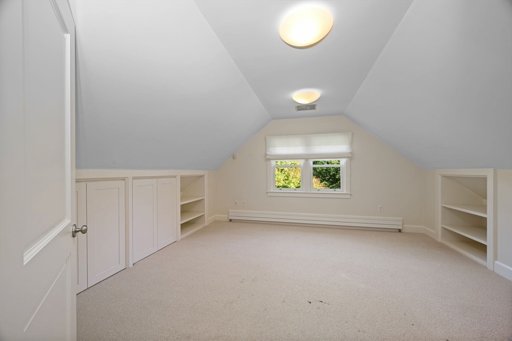 29 Merrill Road Newton, MA 02459 - Photo 28 of 42 an empty room with windows and closet