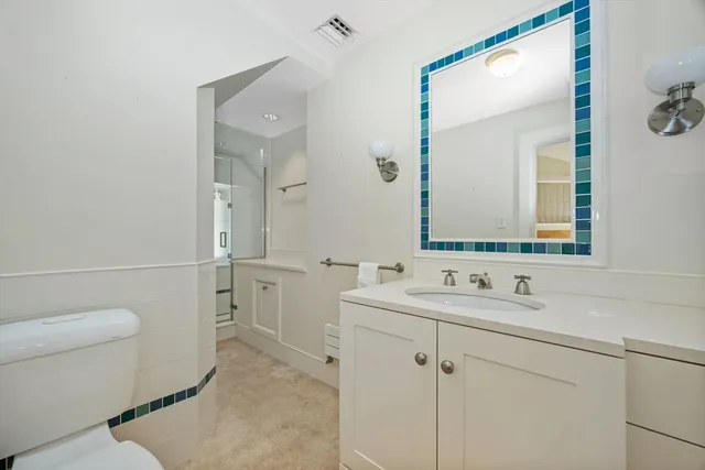 a view of room with window and cabinet