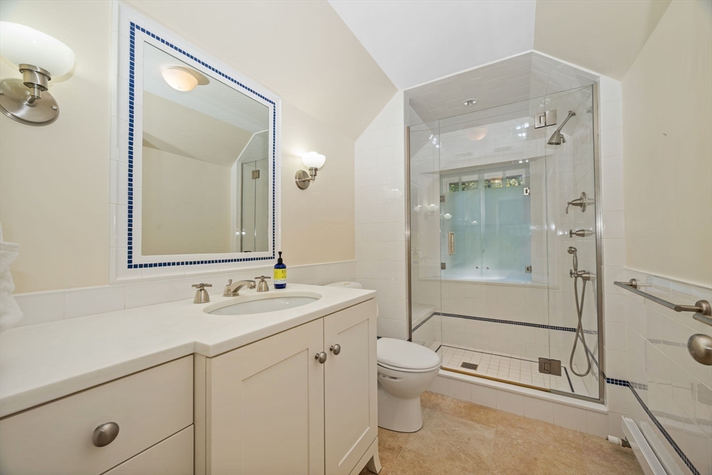 29 Merrill Road Newton, MA 02459 - Photo 32 of 42 a bathroom with a sink a toilet and shower