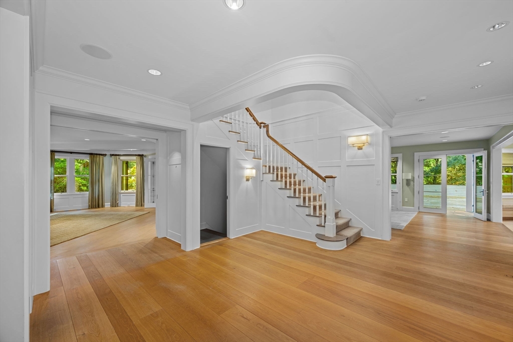 29 Merrill Road Newton, MA 02459 - Photo 4 of 42 a view of empty room with wooden floor and fan