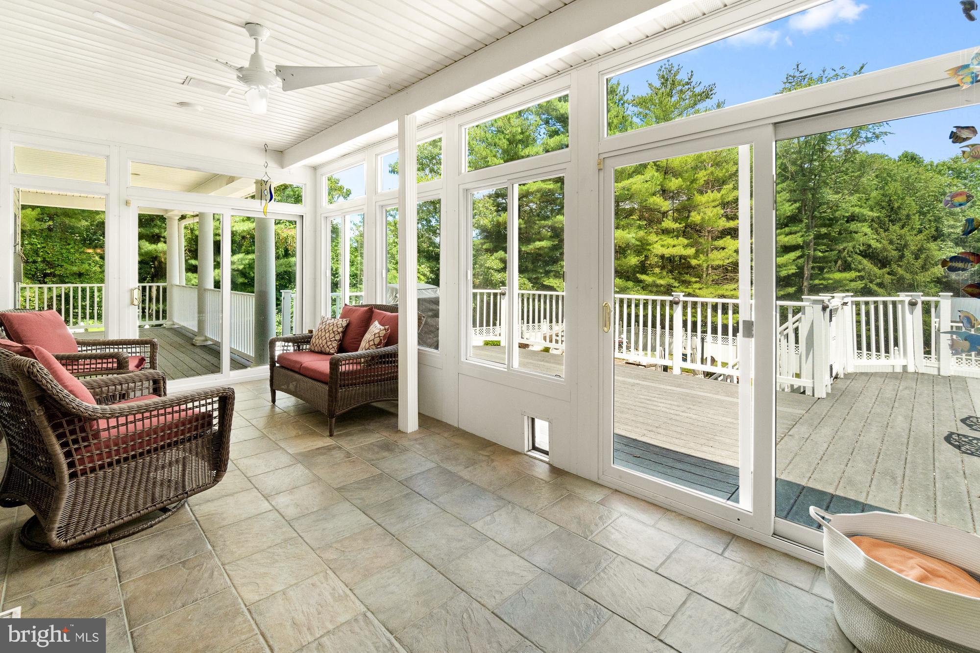 9836 Watkins Road Gaithersburg, MD 20882 - Photo 35 of 70 Screened in porch leads to the deck