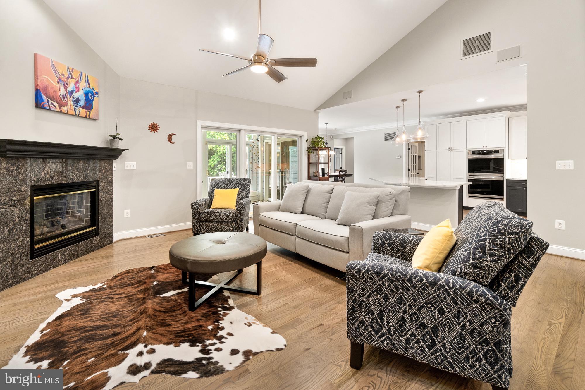 9836 Watkins Road Gaithersburg, MD 20882 - Photo 10 of 70 Gas fireplace and red oak hardwood floors