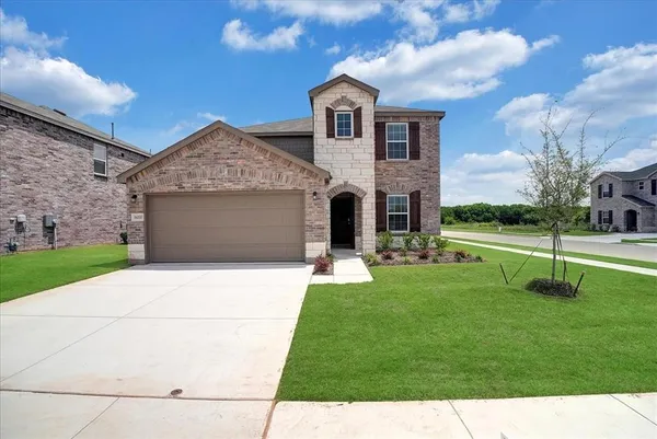 a front view of house with yard