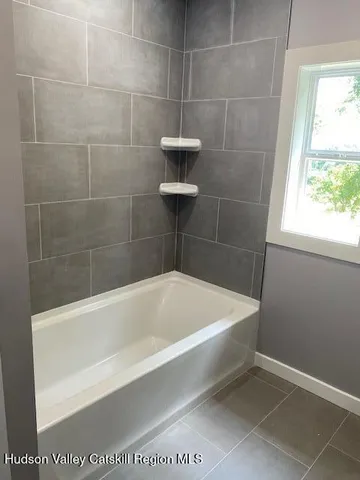 a bathroom with a bathtub