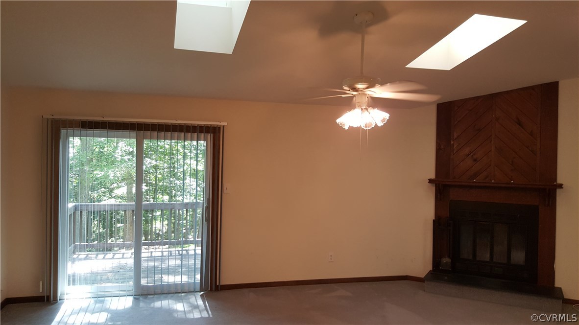 4801 Fordham Road Chesterfield, VA 23236 - Photo 2 of 15 a view of a livingroom with a ceiling fan and window