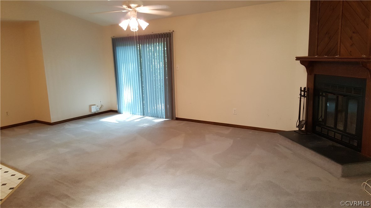 4801 Fordham Road Chesterfield, VA 23236 - Photo 10 of 15 a view of an empty room with a fireplace