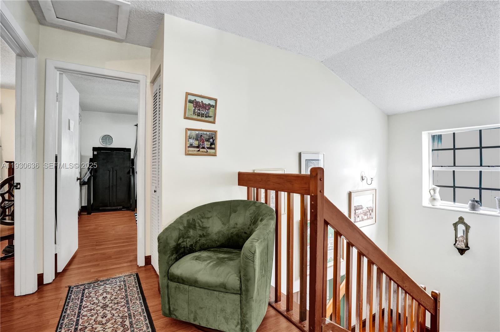11728 Southwest 118th Terrace Miami, FL 33186 - Photo 19 of 31 a living room with furniture and a wooden floor