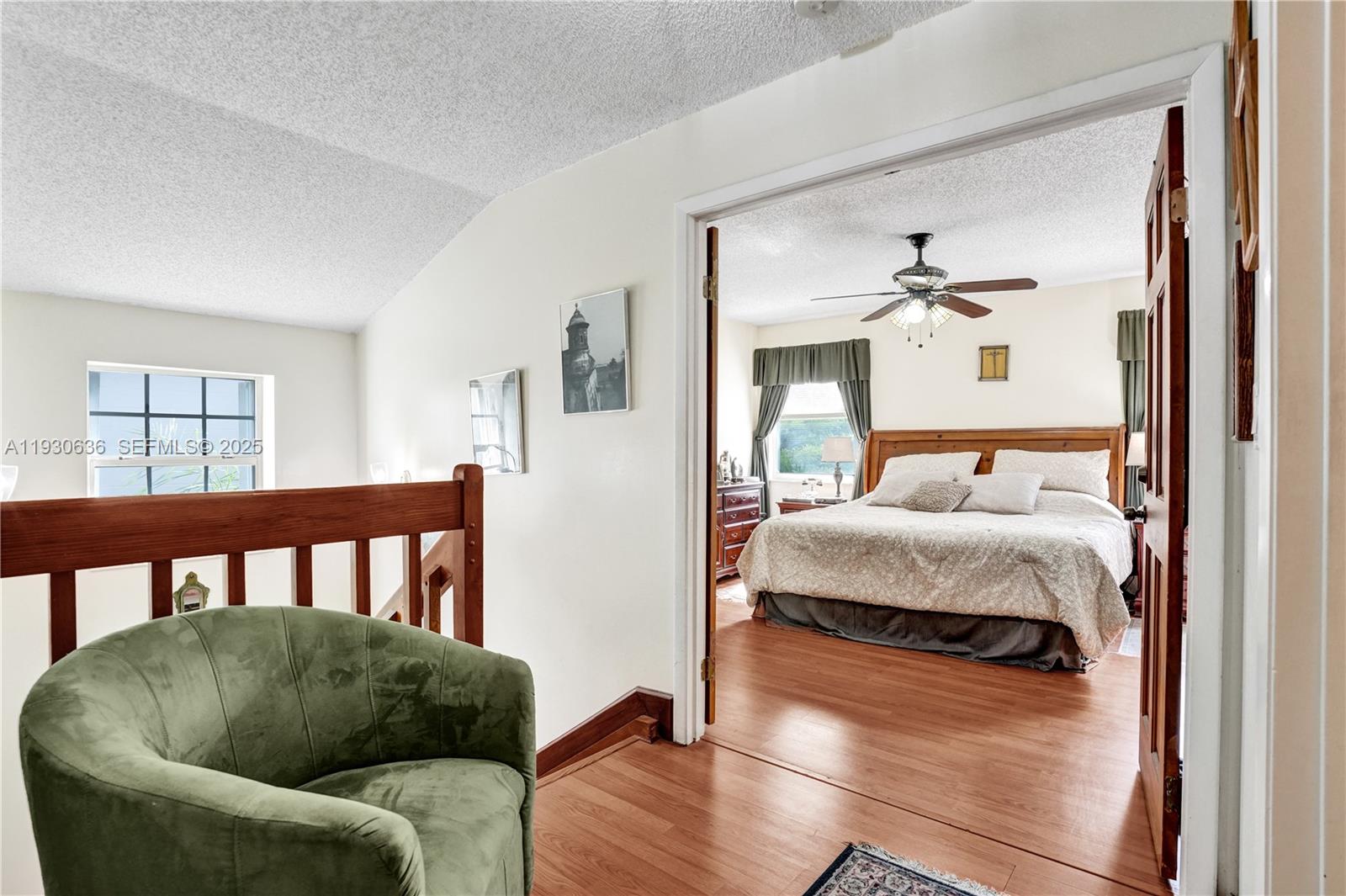 11728 Southwest 118th Terrace Miami, FL 33186 - Photo 20 of 31 a bedroom with furniture and wooden floor