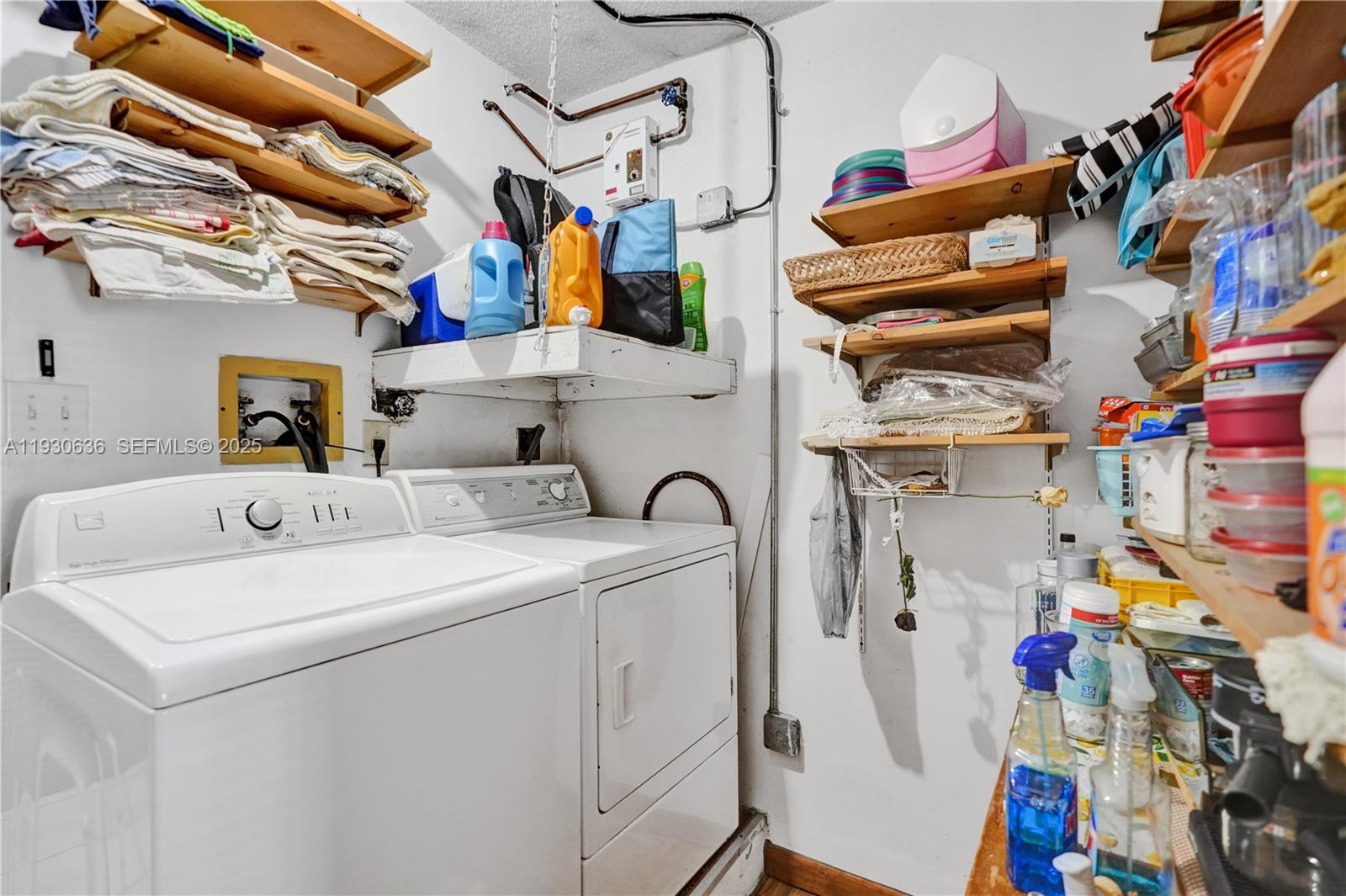 11728 Southwest 118th Terrace Miami, FL 33186 - Photo 22 of 31 a utility room with dryer and washer
