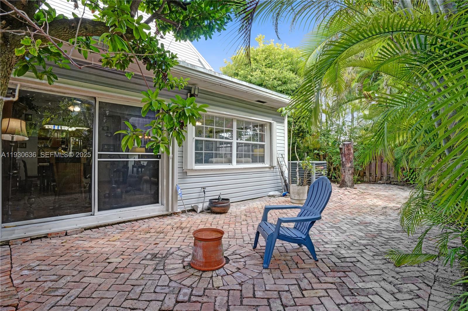 11728 Southwest 118th Terrace Miami, FL 33186 - Photo 25 of 31 a backyard of a house with seating space