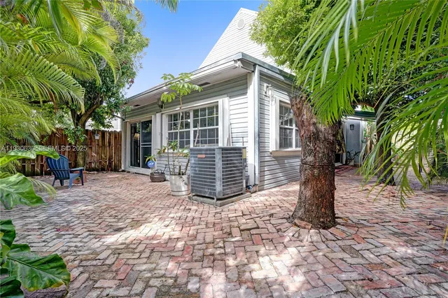 a front view of a house with a porch