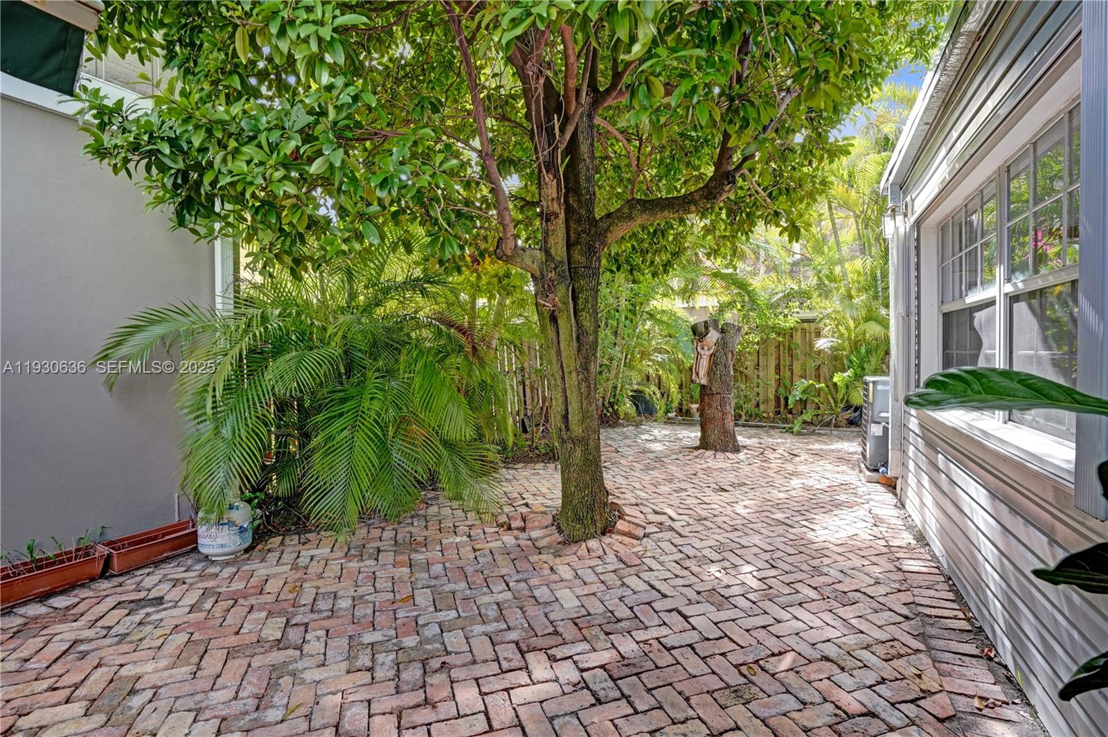 11728 Southwest 118th Terrace Miami, FL 33186 - Photo 28 of 31 a view of a pathway with a garden