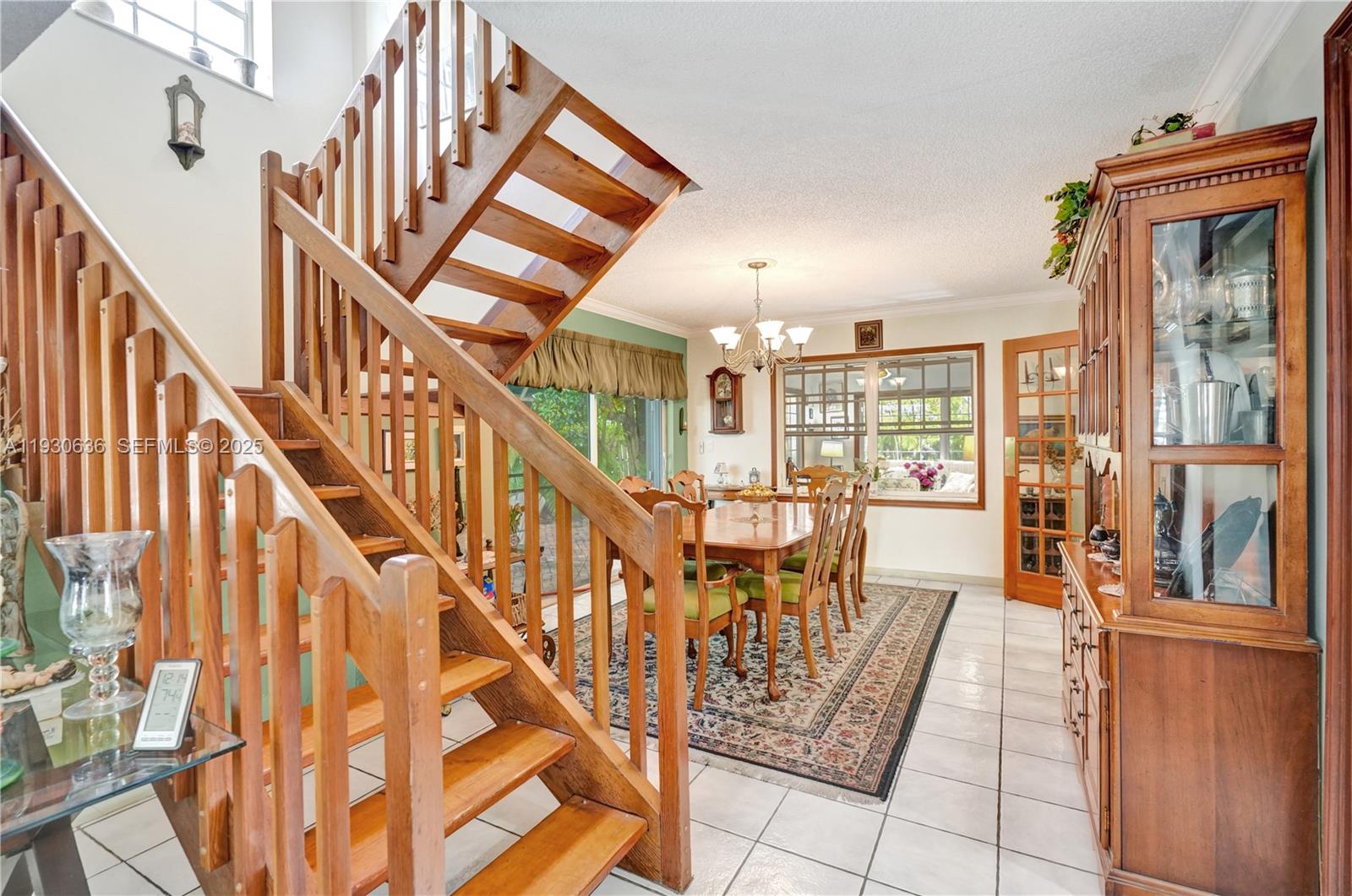 11728 Southwest 118th Terrace Miami, FL 33186 - Photo 10 of 31 a view of entryway and hall with wooden floor