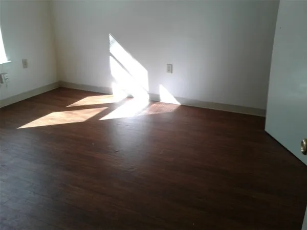 a bathroom with a toilet and a sink