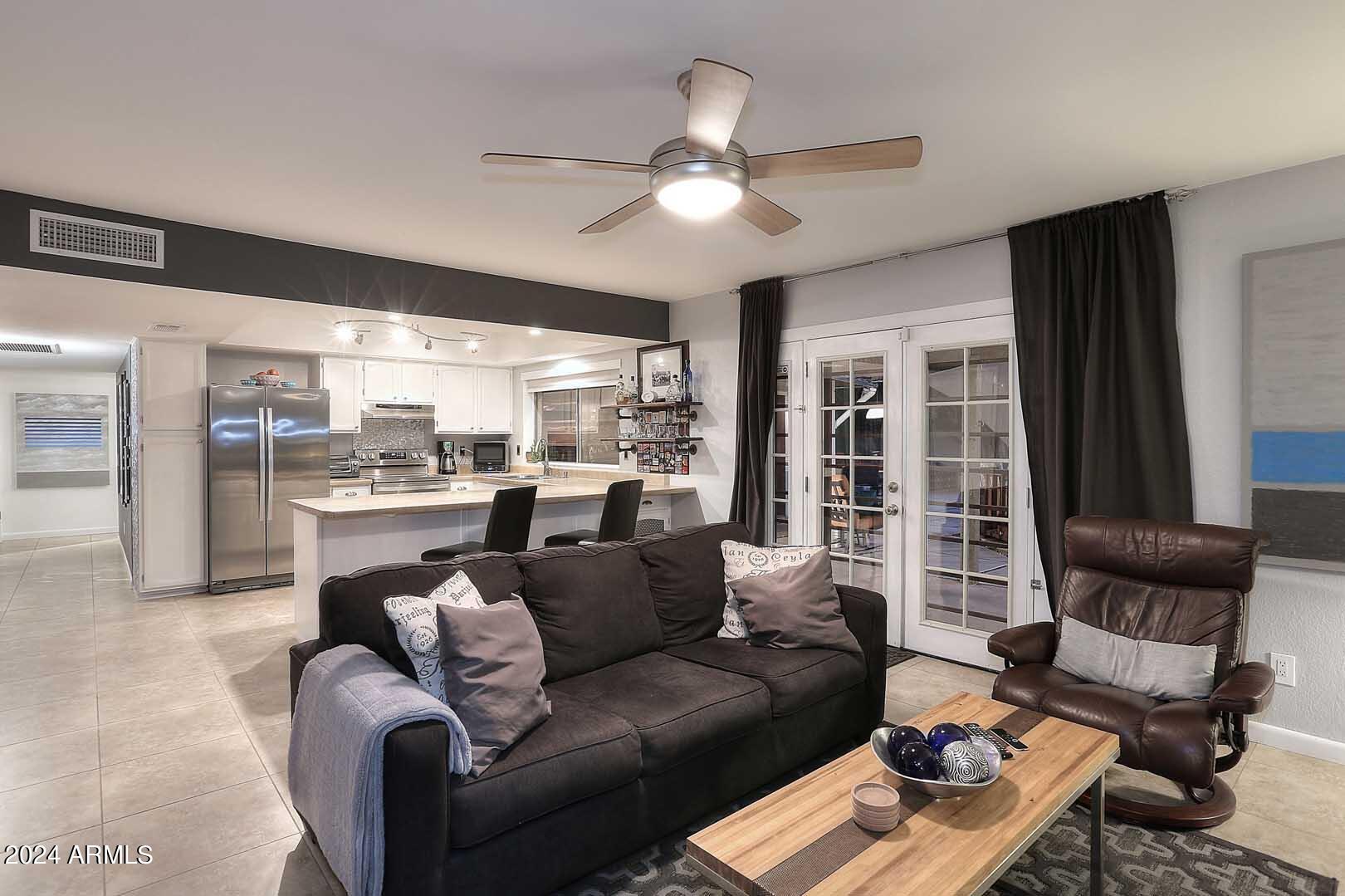 2415 West Redfield Road Phoenix, AZ 85023 - Photo 21 of 71 Night-Family Room-Kitchen