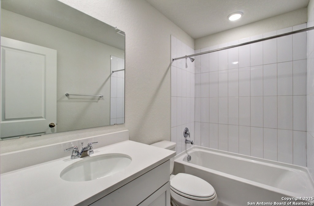 3625 Meteor Road New Braunfels, TX 78130 - Photo 26 of 39 a bathroom with a sink toilet bathtub and shower