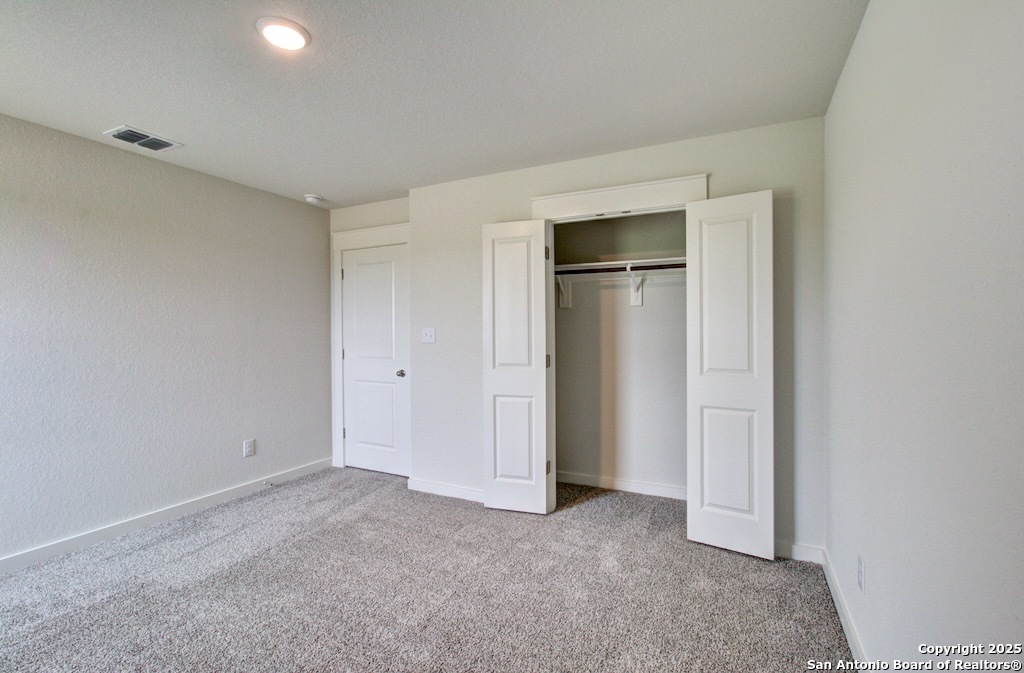 3625 Meteor Road New Braunfels, TX 78130 - Photo 32 of 39 a view of an empty room and closet area