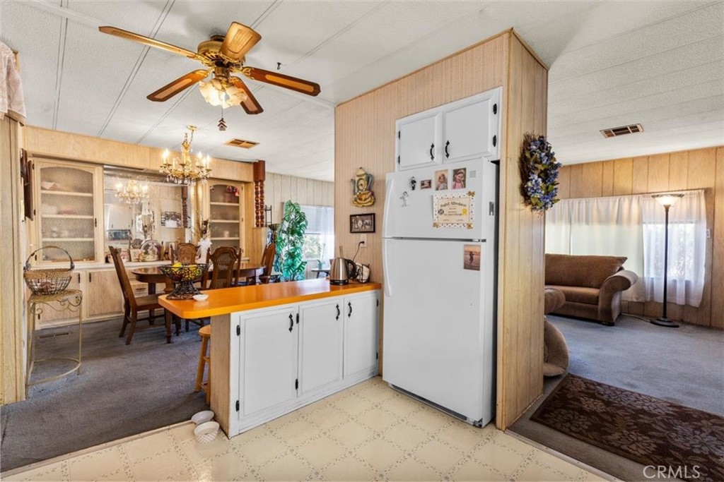 300 North Rampart Street, Unit 42 Orange, CA 92868 - Photo 11 of 37 Virtually Staged: Kitchen Wide View