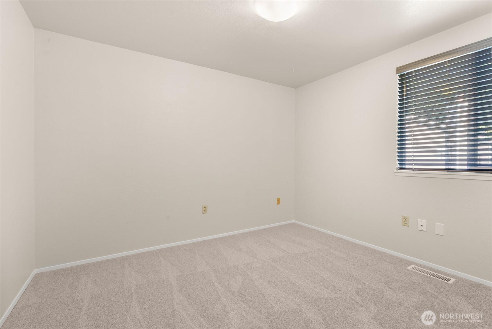 13603 Southeast 239th Street Kent, WA 98042 - Photo 14 of 23 an empty room with a window