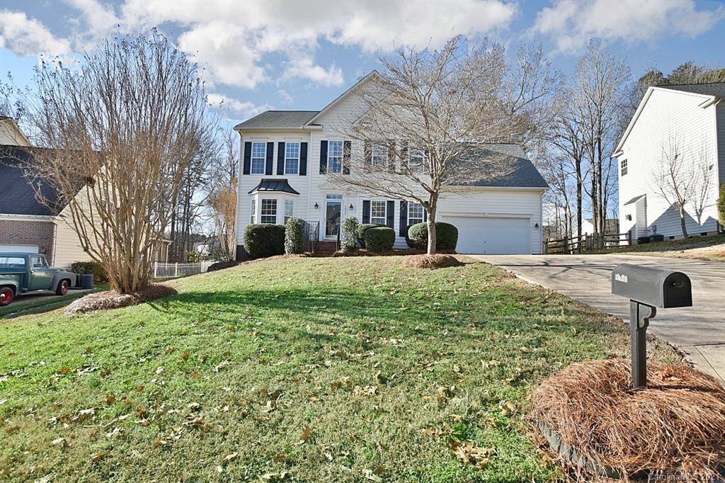 1021 Kilpatrick Lane Fort Mill, SC 29708 - Photo 1 of 34 a front view of a house with garden