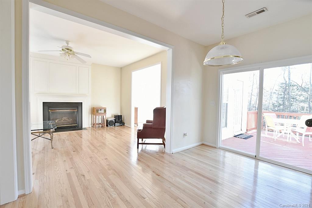 1021 Kilpatrick Lane Fort Mill, SC 29708 - Photo 19 of 34 a view of an empty room with wooden floor and a window