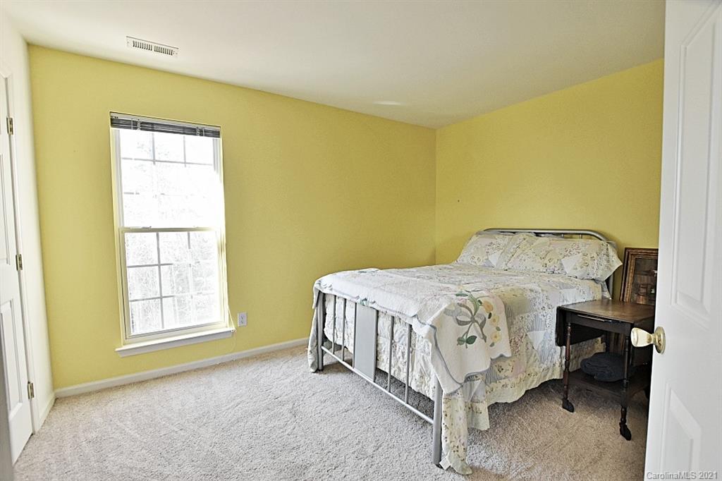 1021 Kilpatrick Lane Fort Mill, SC 29708 - Photo 28 of 34 a bedroom with a bed and a window