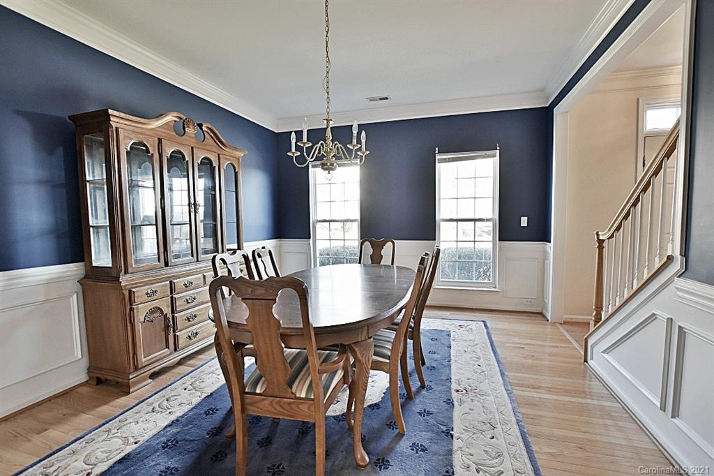 1021 Kilpatrick Lane Fort Mill, SC 29708 - Photo 6 of 34 a view of a dining room with furniture window and wooden floor