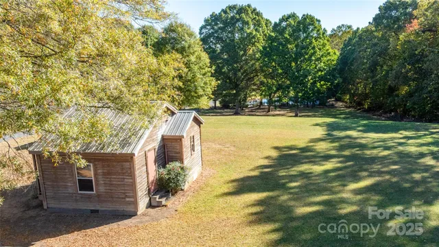 a view of a yard with an outdoor space