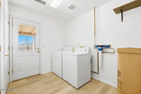 a utility room with dryer and washer