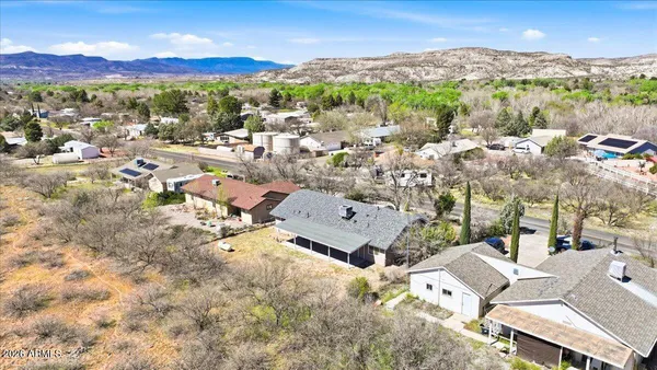an aerial view of residential house with outdoor space