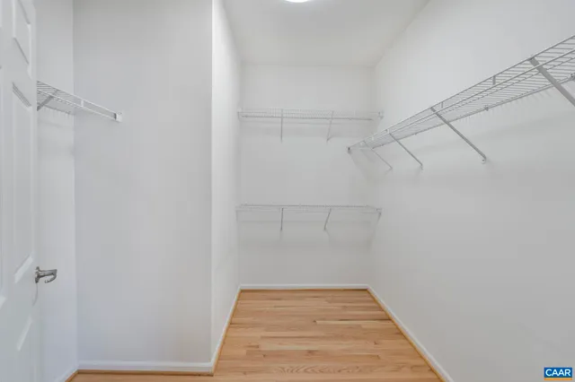 a view of a room with racks on the wall