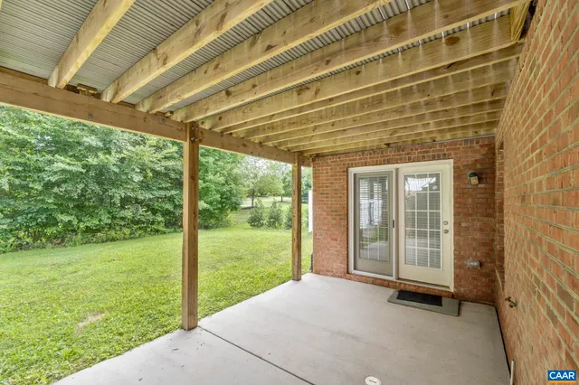 a view of a room with a large window