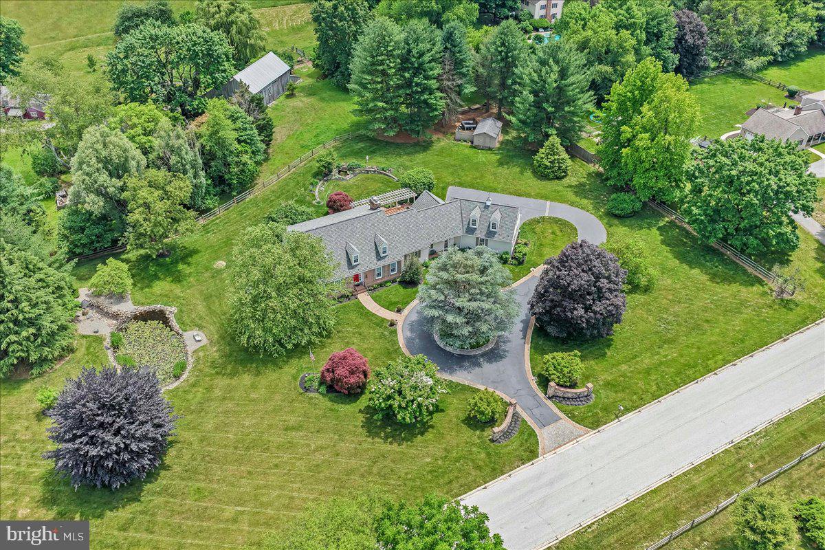 7 Bolingbroke Road West Chester, PA 19382 - Photo 52 of 86 Serene estate surrounded by lush greenery.