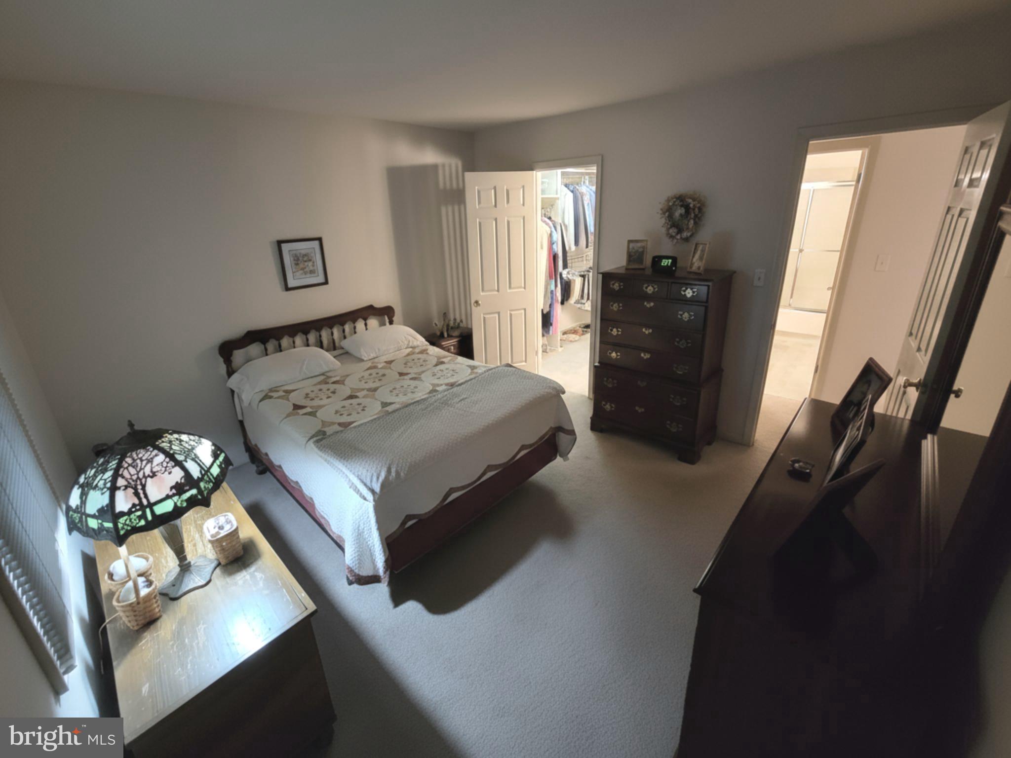 588 Crosswinds Drive Lititz, PA 17543 - Photo 13 of 38 a bedroom with a bed and a dresser in it