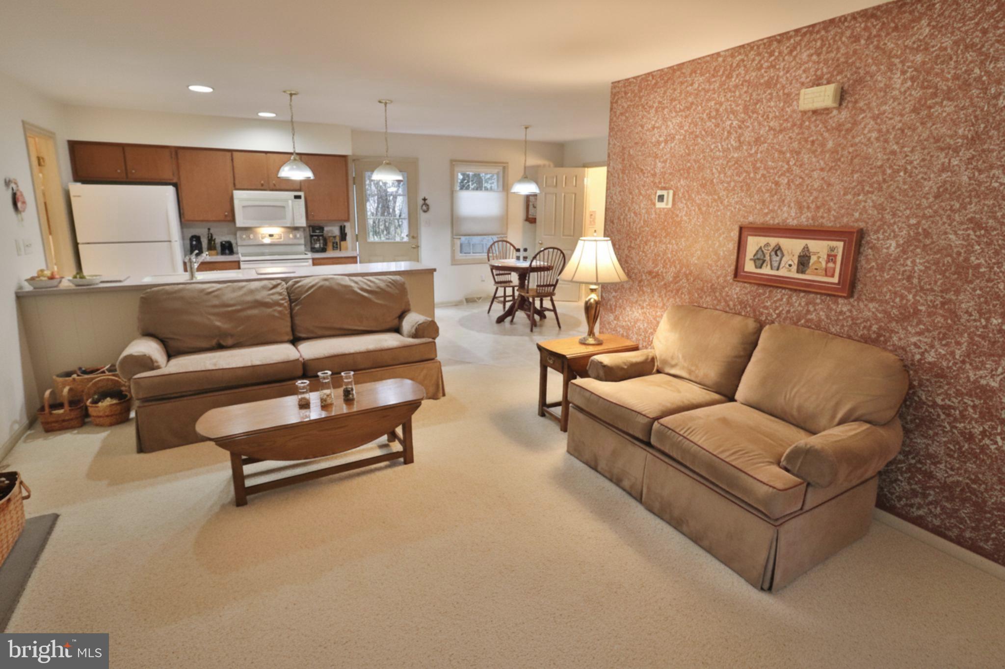 588 Crosswinds Drive Lititz, PA 17543 - Photo 18 of 38 a living room with furniture and a wooden floor