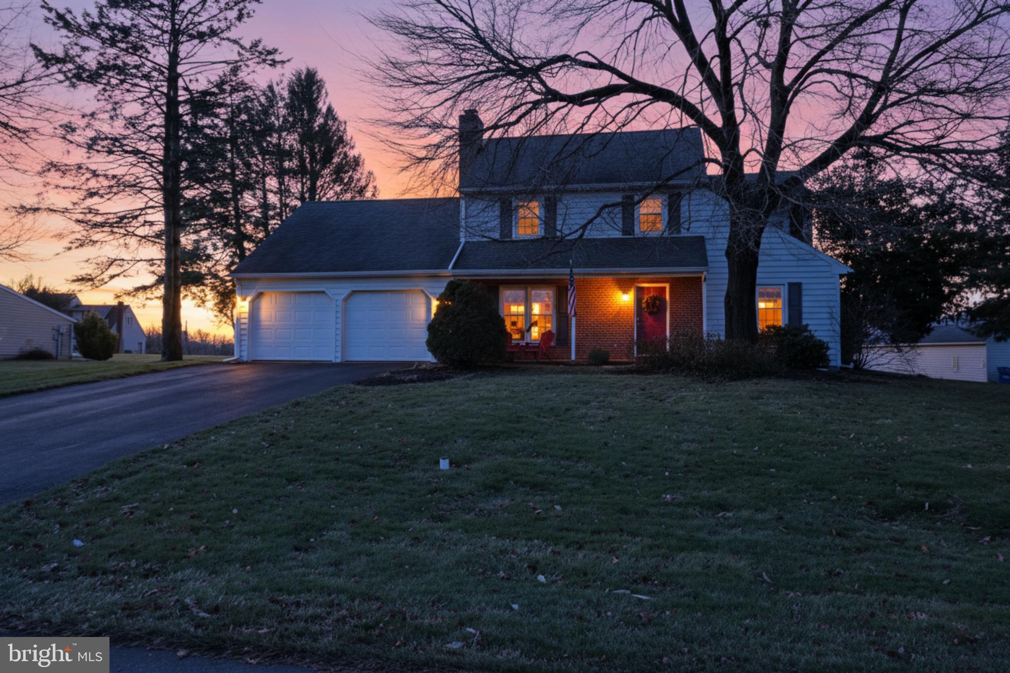 588 Crosswinds Drive Lititz, PA 17543 - Photo 2 of 38 a front view of a house with a yard