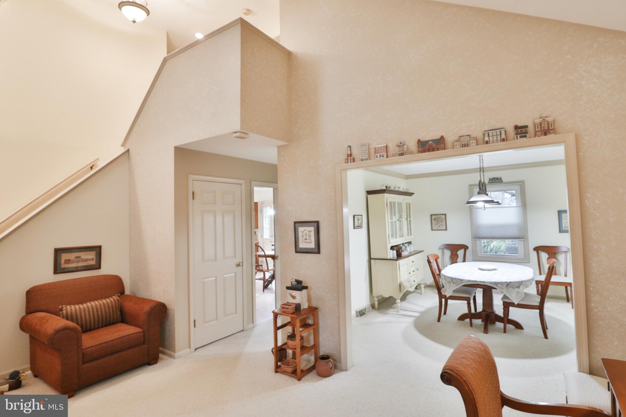 588 Crosswinds Drive Lititz, PA 17543 - Photo 24 of 38 a living room with furniture and a mirror