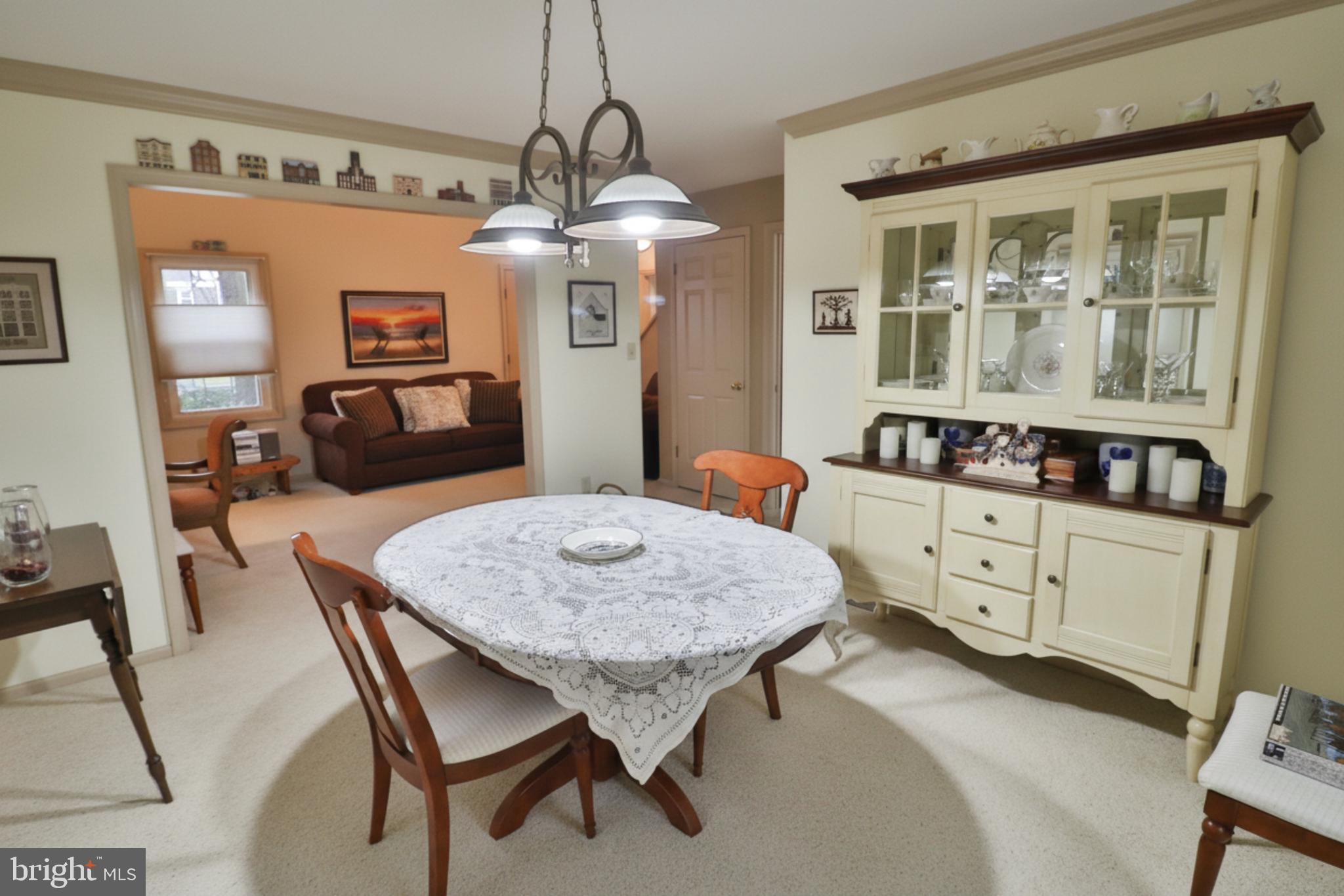 588 Crosswinds Drive Lititz, PA 17543 - Photo 26 of 38 a view of a dining room with furniture and chandelier