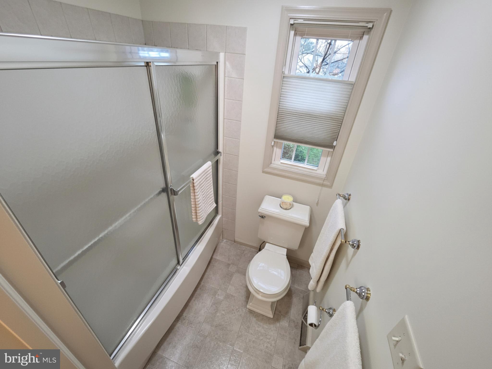 588 Crosswinds Drive Lititz, PA 17543 - Photo 29 of 38 a bathroom with a toilet a sink and shower