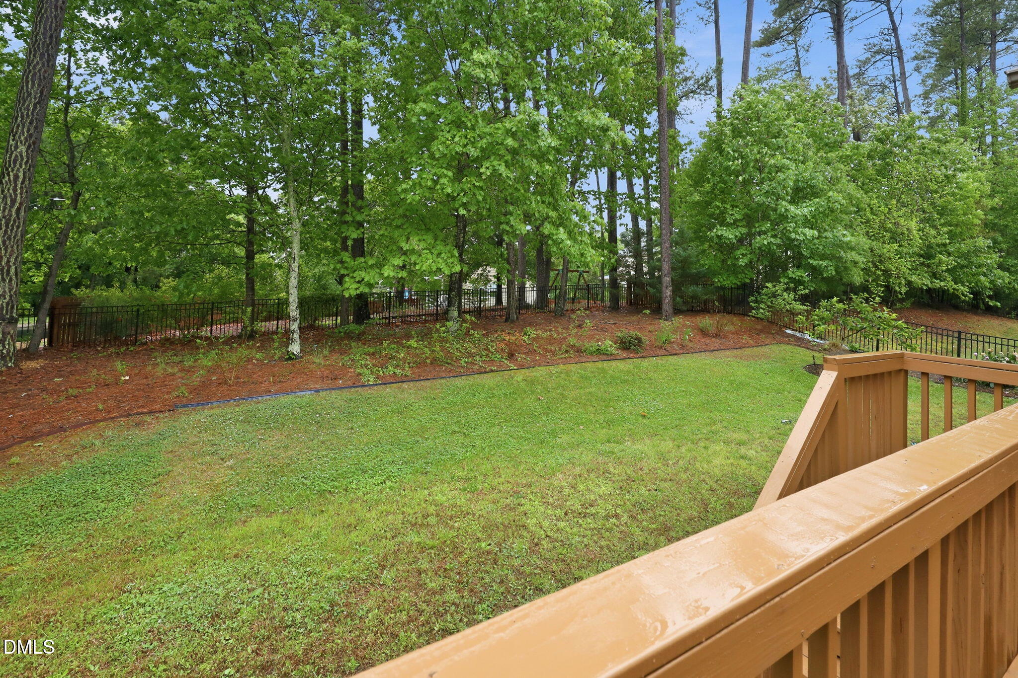 162 Gathering Place Durham, NC 27713 - Photo 45 of 52 a view of a backyard with large trees