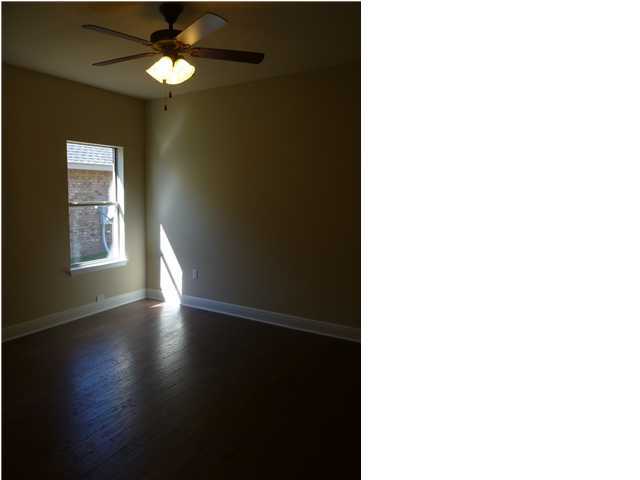 343 Whispering Lake Drive Santa Rosa Beach, FL 32459 - Photo 16 of 22 a view of an empty room with a window