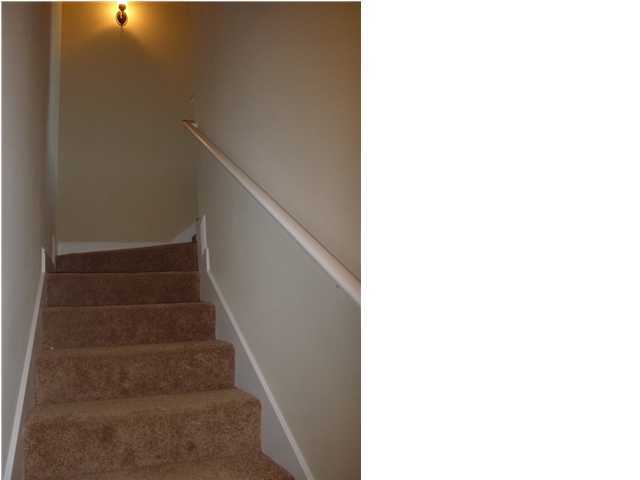 343 Whispering Lake Drive Santa Rosa Beach, FL 32459 - Photo 20 of 22 a view of staircase with white walls