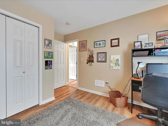 a bedroom with furniture and a bed