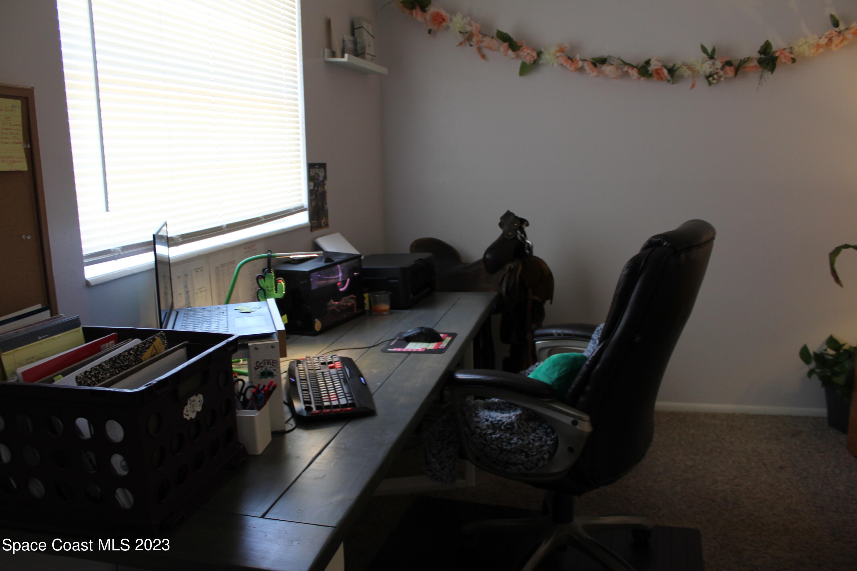 2780 Locksley Road Melbourne, FL 32935 - Photo 20 of 25 a view of workspace with a window