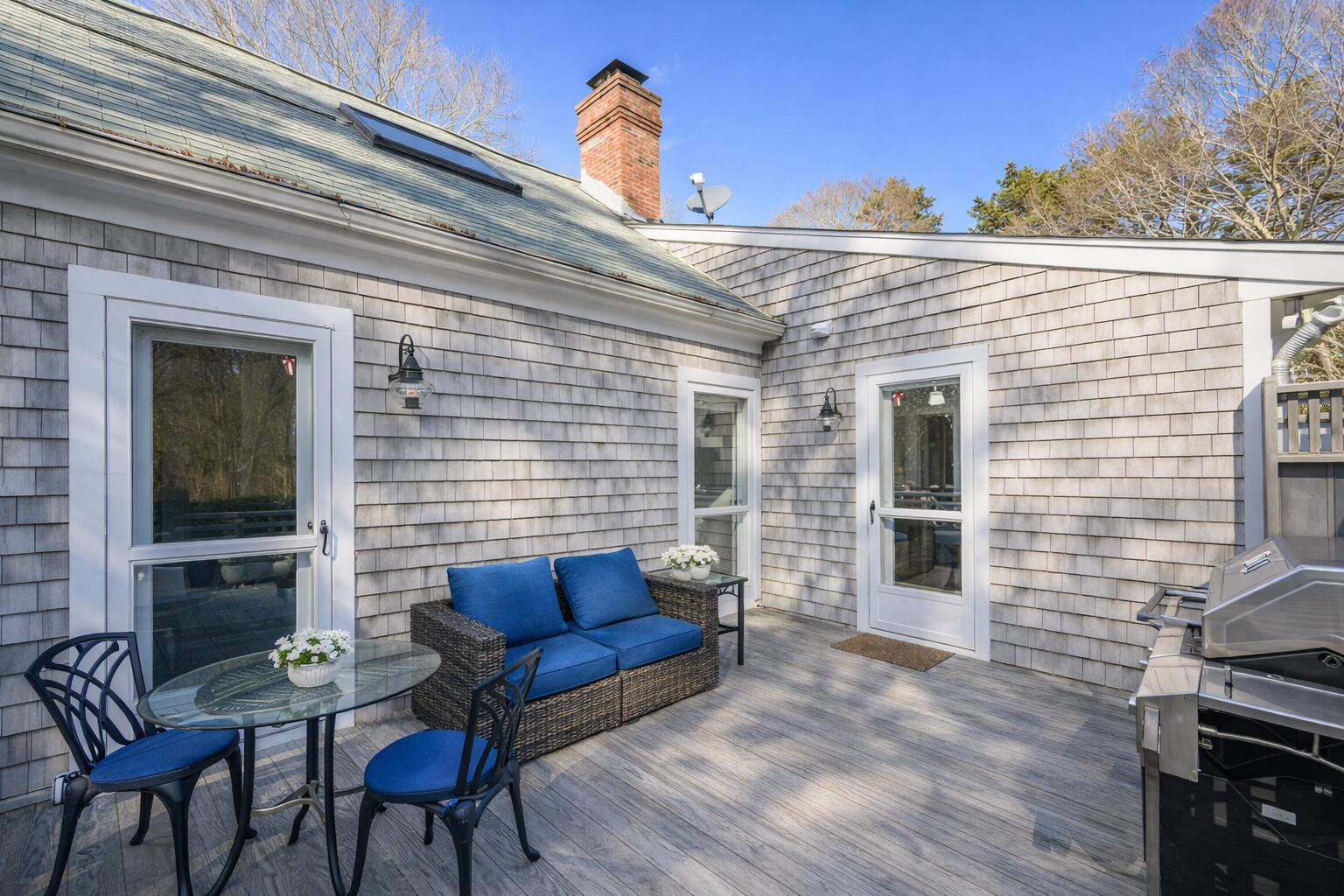 578 Huckins Neck Road Centerville, MA 02632 - Photo 35 of 51 Charming Cape Cod deck in fall
