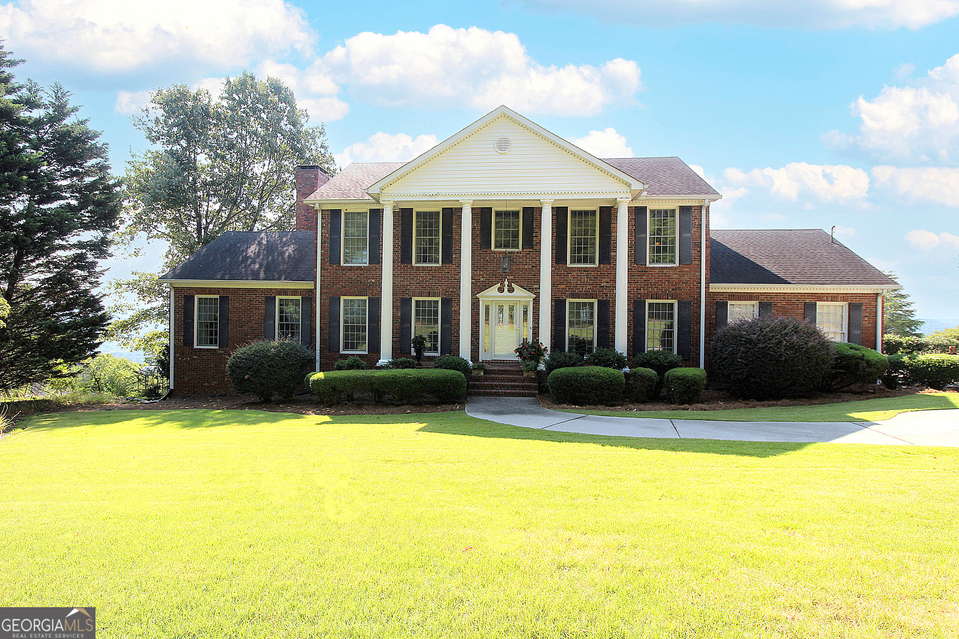 413 Mt Alto Road Southwest Rome, GA 30165 - Photo 1 of 1 a front view of house with yard and trees in the background
