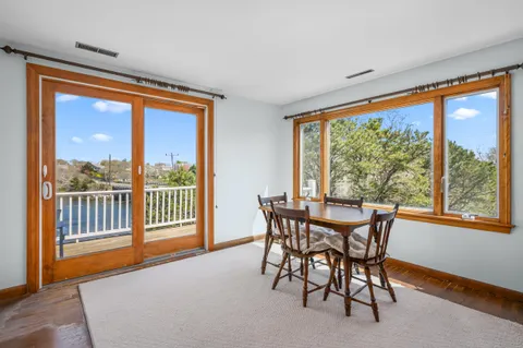 a view of balcony with furniture