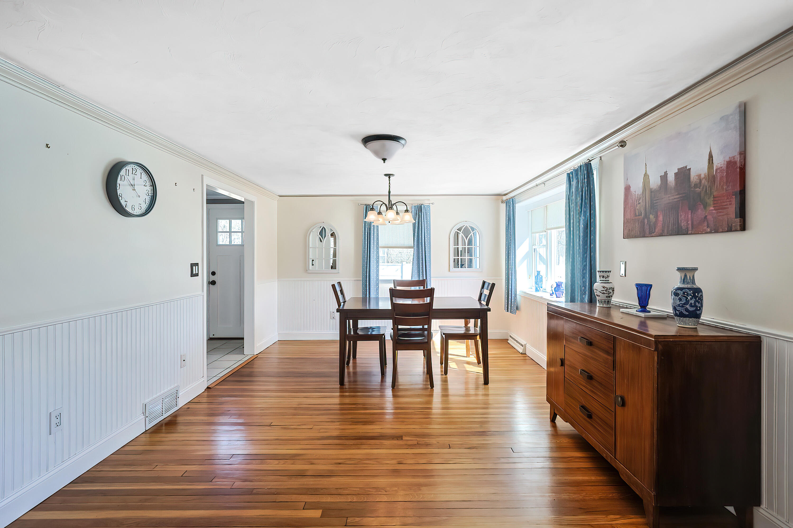 9 Marilyn Road Bourne, MA 02532 - Photo 12 of 54 a view of a dining room with furniture window and wooden floor