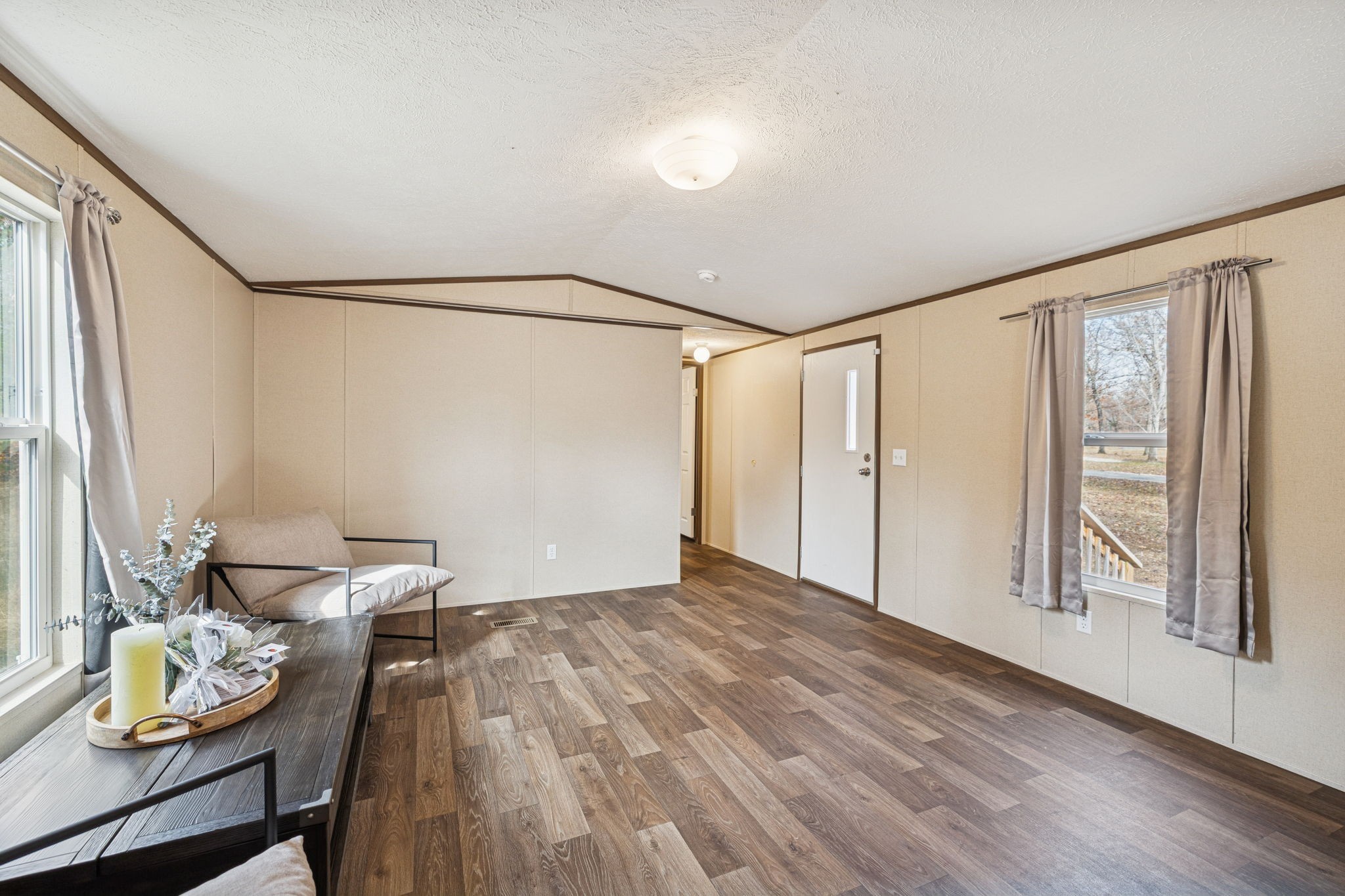 108 Lyell Road Hohenwald, TN 38462 - Photo 5 of 28 a bedroom with furniture and a window