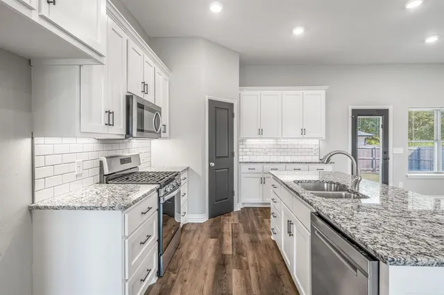 a view of room with window hardwood floor and window